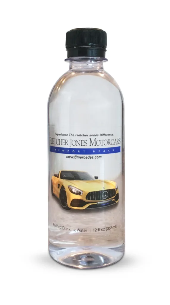 12 oz bottle of custom label water for Fletcher Jones Newport Dealership by Glacier Beverage